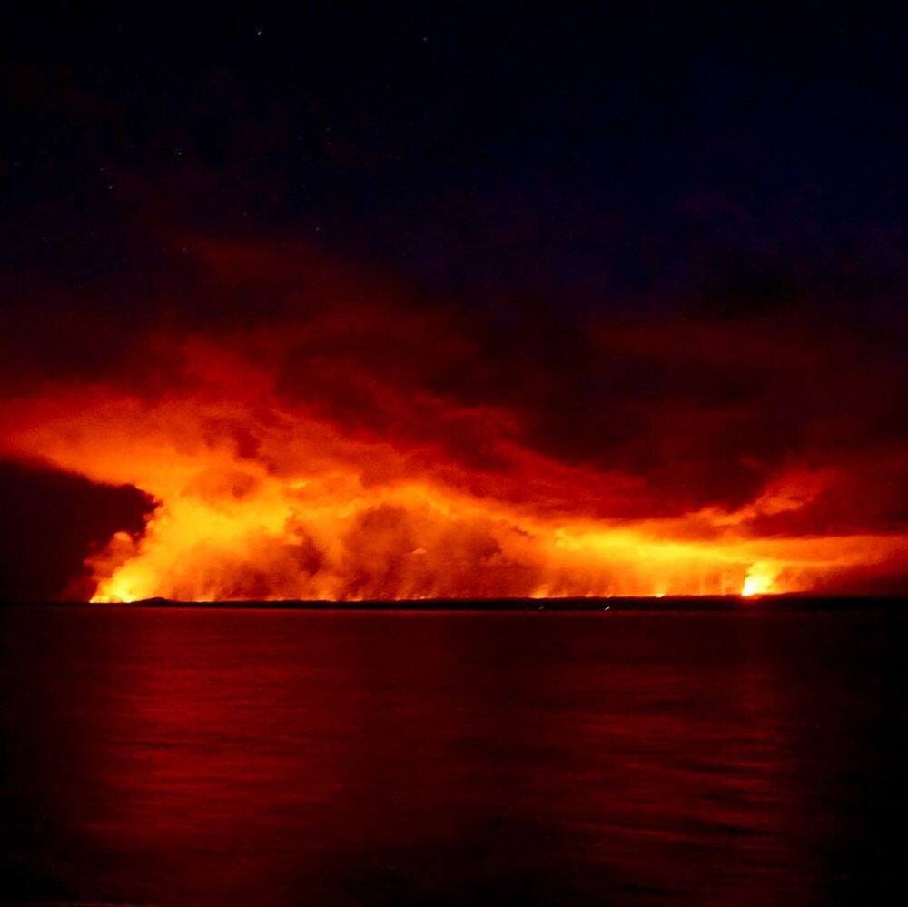 Nighttime sail past Kilauea Volcano – Big Island Nighttime sail past Kilauea Volcano – Big Island